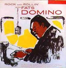 Album cover for 'Rock And Rollin With Fats Domino' album featuring the song 'Aint That A Shame' by Fats Domino – Learn to play on guitar.
