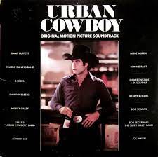 Album cover of Urban Cowboy featuring best songs by The Eagles and the song All Night Long Album cover of Urban Cowboy featuring best songs by The Eagles and the song All Night Long