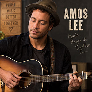 Amos Lee playing acoustic guitar Amos Lee playing acoustic guitar