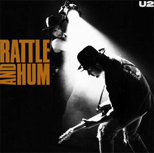 Album cover of Rattle And Hum featuring U2 best of U2 songs and the song Angel Of Harlem Album cover of Rattle And Hum featuring U2 best of U2 songs and the song Angel Of Harlem