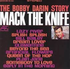 Album cover for 'The Bobby Darin Story' album featuring the song 'Mack The Knife' by Bobby Darin – Learn to play on guitar.
