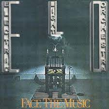 Album cover for 'Face The Music' album featuring the song 'Evil Woman' by ELO – Learn to play on guitar.