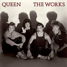 Learn to play 'Hammer To Fall' by Queen – Chords & Lesson. Album cover for 'The Works' album featuring the song 'Hammer To Fall' by Queen – Learn to play on guitar.