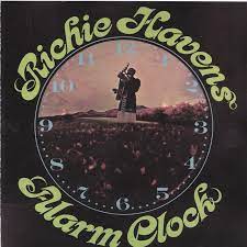 Album cover of alarm clock featuring best of the blues songs and the song here cones the sun Album cover of alarm clock featuring best of the blues songs and the song here cones the sun