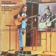 Album cover for 'Same Train A Different Time' album featuring the song 'Hobos Meditation' by Merle Haggard – Learn to play on guitar.