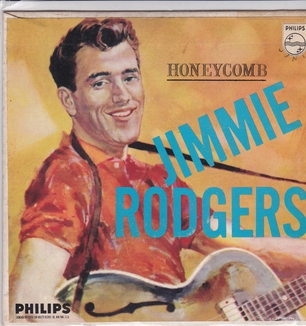 Album cover for 'Jimmie Rogers Honeycomb' album featuring the song 'Honeycomb' by Jimmie Rogers – Learn to play on guitar.