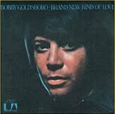 Album cover for 'Brand New Kind Of Love' album featuring the song 'I Wrote A Song' by Bobby Goldsboro – Learn to play on guitar.