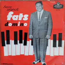 Album cover for 'Here Stands Fats Domino' album featuring the song 'Im Walkin' by Fats Domino – Learn to play on guitar.