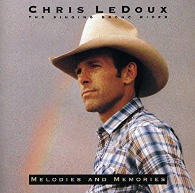 Album cover for 'Melodies And Memories' album featuring the song 'Melodies And Memories' by Chris Ledoux – Learn to play on guitar.