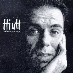 Album cover for 'Bring The Family' album featuring the song 'Memphis In The Meantime' by John Hiatt – Learn to play on guitar.