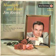 Album cover of Midnight And Roses featuring Jim Reeves country songs and the song Midnight And Roses Album cover of Midnight And Roses featuring Jim Reeves country songs and the song Midnight And Roses