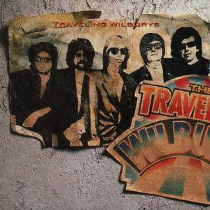 Album cover for 'The Traveling Wilburys Vol 1' album featuring the song 'Not Alone Anymore' by Roy Orbison – Learn to play on guitar.