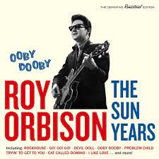 Album cover for 'The Sun Years' album featuring the song 'Ooby Dooby' by Roy Orbison – Learn to play on guitar.