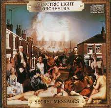 Album cover for 'Secret Messages' album featuring the song 'Rock And Roll Is King' by ELO – Learn to play on guitar.