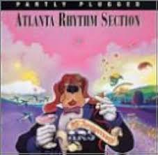 Album cover for 'Party Plugged' album featuring the song 'She Knows All My Tricks' by Atlanta Rhythm Section – Learn to play on guitar.