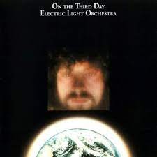 Album cover for 'On The Third Day' album featuring the song 'Showdown' by ELO – Learn to play on guitar.