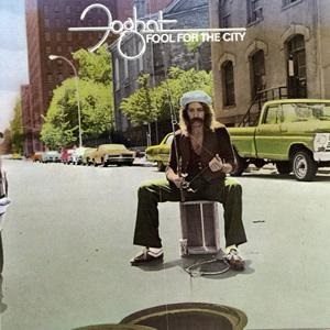 Album cover for 'Fool For The City' album featuring the song 'Slow Ride' by Foghat – Learn to play on guitar.