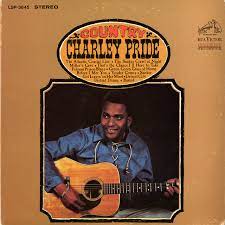 Album cover of Country Charley Pride featuring Charley Pride famous songs and the song The Snakes Crawl At Night Album cover of Country Charley Pride featuring Charley Pride famous songs and the song The Snakes Crawl At Night