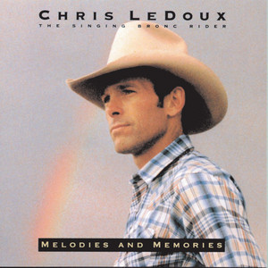 Album cover for 'Melodies And Memories' album featuring the song 'Something In The Wind' by Chris Ledoux – Learn to play on guitar.