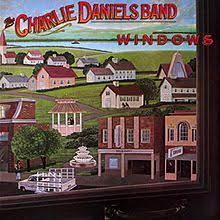 Learn to play 'Still In Saigon' by The Charlie Daniels Band – Chords & Lesson. Album cover for 'Windows' album featuring the song 'Still In Saigon' by The Charlie Daniels Band – Learn to play on guitar.