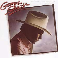 Learn to play 'The Fireman' by George Strait – Chords & Lesson. Album cover for 'Does Fort Worth Ever Cross Your Mind' featuring 'The Fireman' by George Strait – Learn guitar chords.