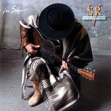 Album cover of srv in step featuring best of the blues songs and the song the house is a rockin Album cover of srv in step featuring best of the blues songs and the song the house is a rockin