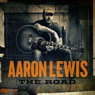 Album cover for 'The Road' album featuring the song 'The Road' by Aaron Lewis. Album cover for 'The Road' album featuring the song 'The Road' by Aaron Lewis.