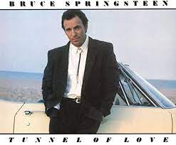 Album cover for 'Tunnel Of Love' album featuring the song 'v' by Bruce Springsteen – Learn to play on guitar.