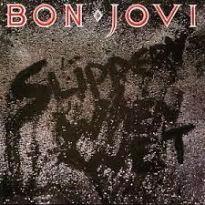 Album cover for 'Slippery When Wet' album featuring the song 'Wanted Dead Or Alive' by Bon Jovi – Learn to play on guitar.