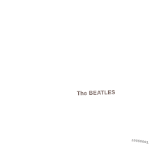 Album cover of White Album featuring the song "While My Guitar Gently Weeps" The Beatles. Album cover of White Album featuring the song "While My Guitar Gently Weeps" The Beatles.