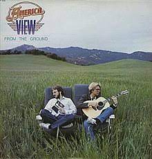 Album cover for 'View From The Ground' album featuring the song 'You Can Do Magic' by America – Learn to play on guitar.